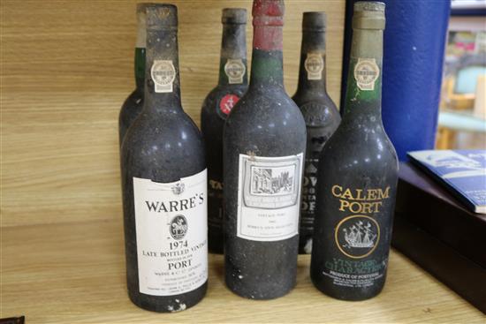 Twelve assorted bottles of port including Warres, 1955(2), Cockburn, 1955(1) all Wine Society